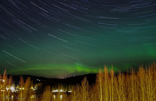 Northern lights and star trails